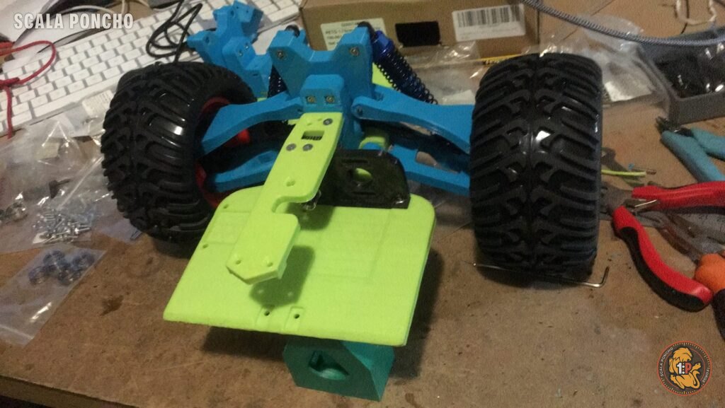 Auto RC stampata in 3D con le prime ruote montate sul banco di lavoro